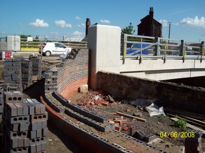 New walls being constructed at the deck ends