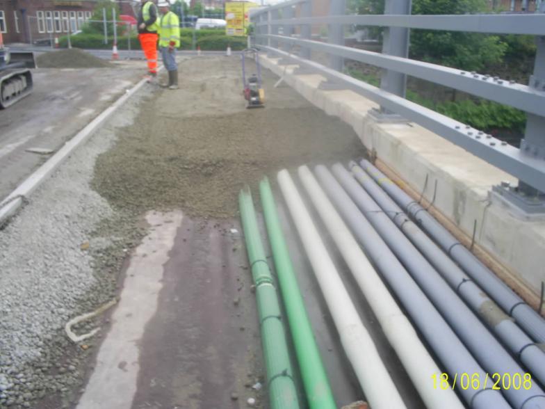 Bridge Deck srvices being concreted over.