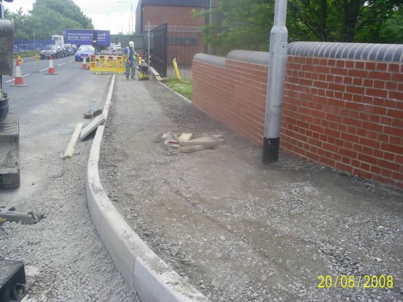 Footpaths being topped up with concrete.