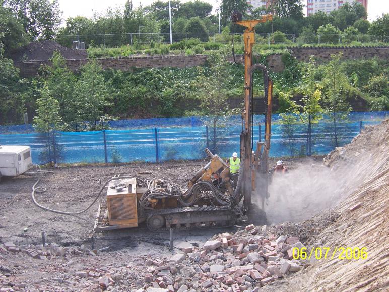 Drilling and grouting in progress North abutment