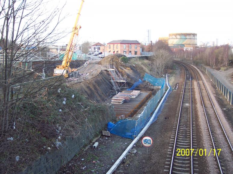 South Abutment progressing with crane lifting shutters