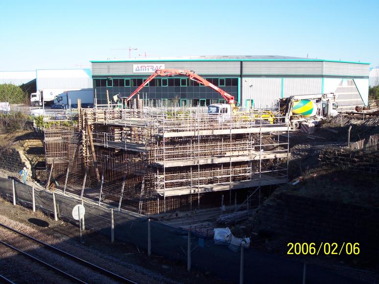 North Abutment wingwall being cast with concrete pump