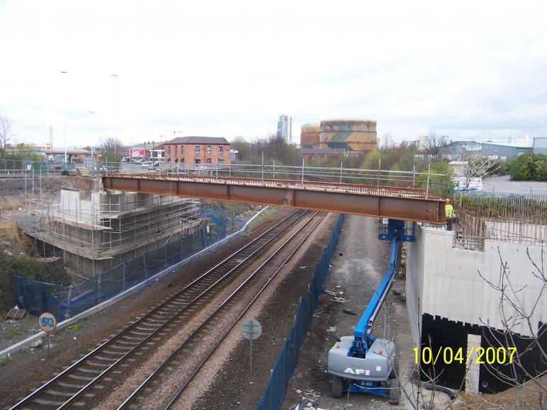 Beams lifted into place and set.