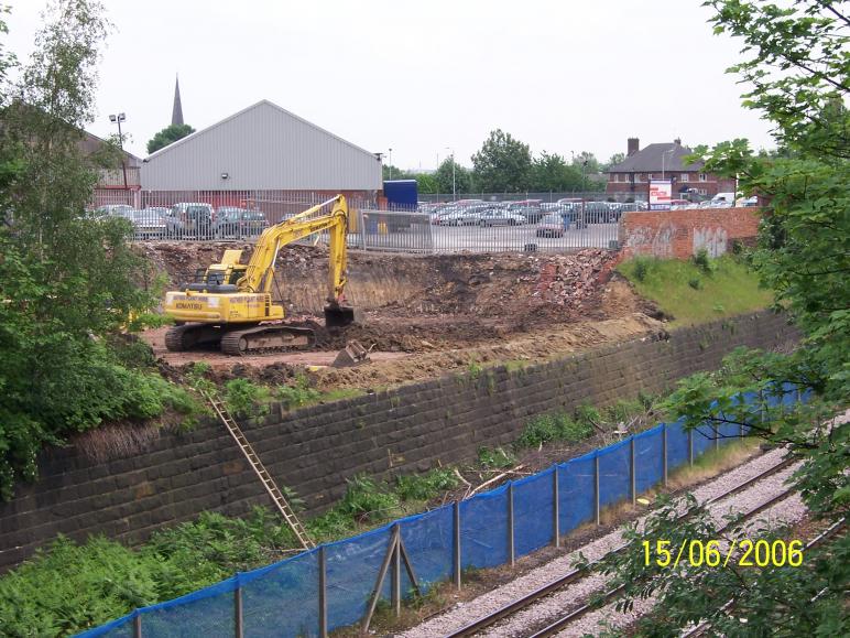 North Abutment being dug out and wall being broken down