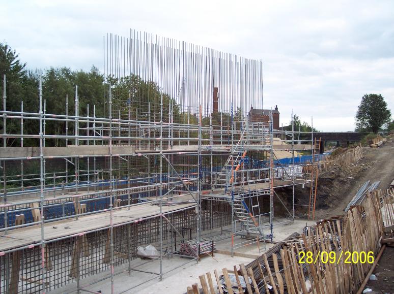 South Abutment scaffold being erected and steel wall reinforcement being fixed.