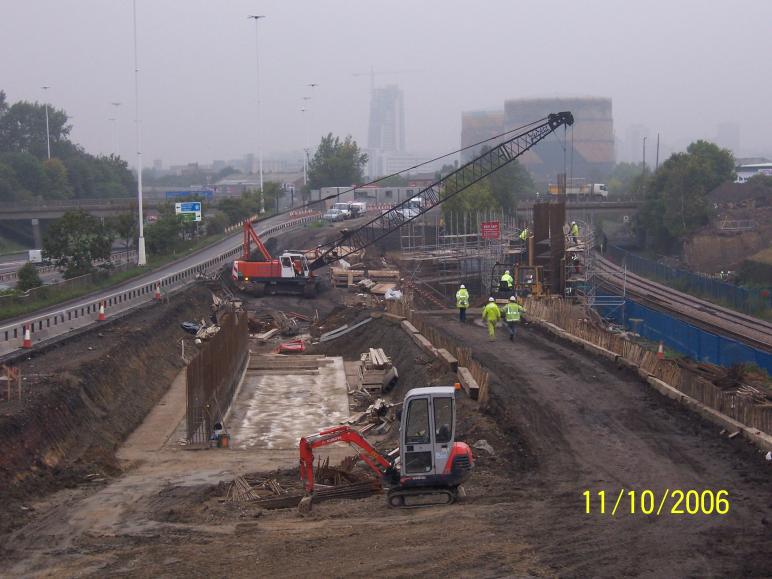 Formwork Being erected by crawler crane.