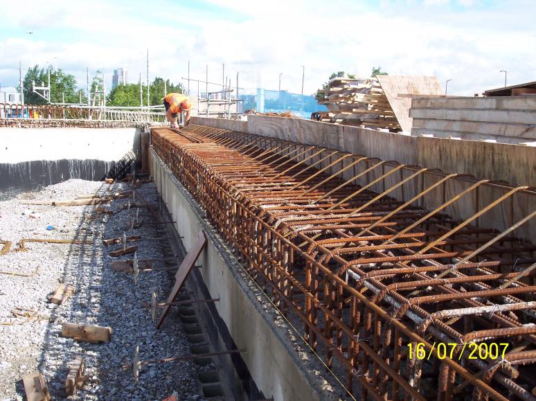 Outside ballast wall upstand being fixed