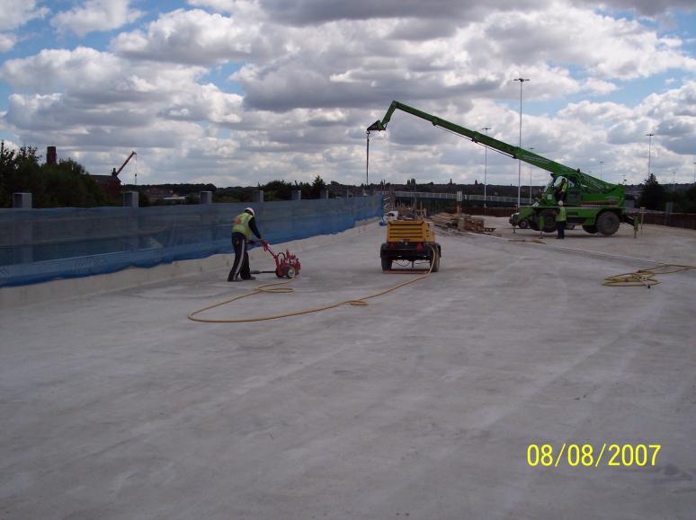 Forklift lifting out temporary works from the deck