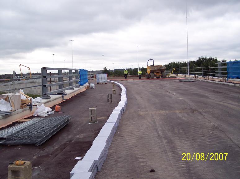 Hydro kerbs being set up on the bridge deck.