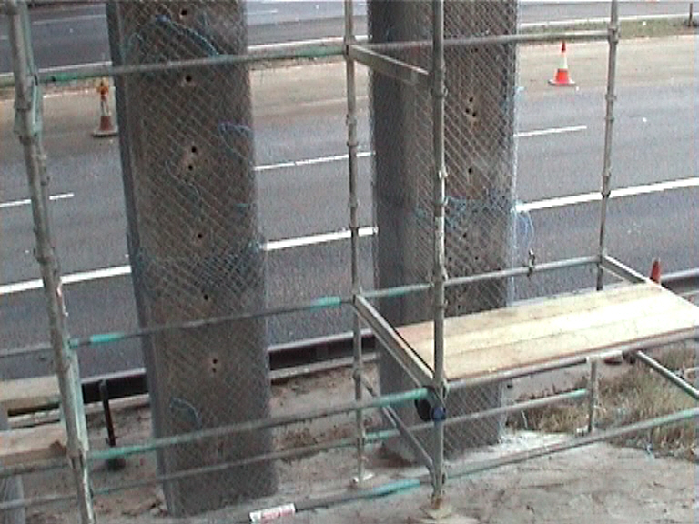 Drilling to columns and wrapped with weld mesh