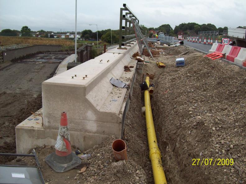 New Gas main being installed over the bridge.