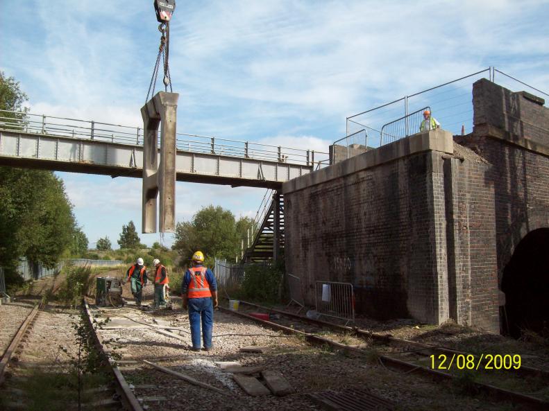 Crane lifting out the final trestle