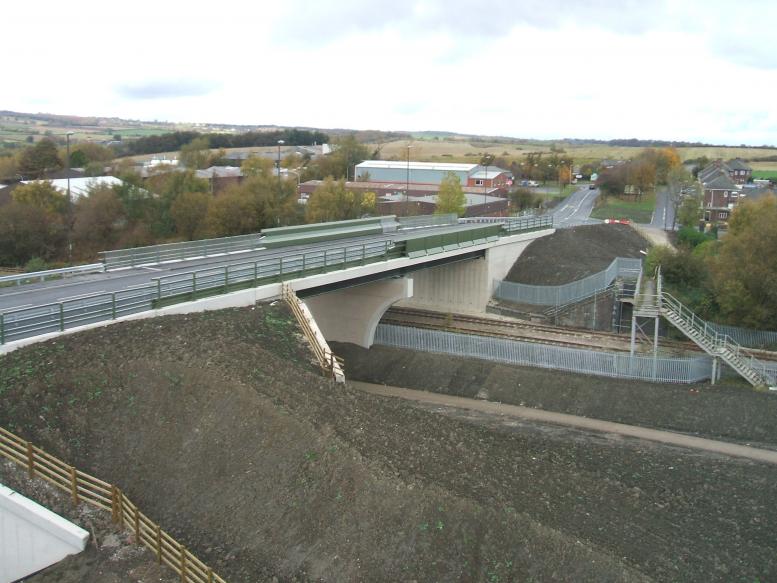 Final Project completed with fences in place. New bridge fully open.