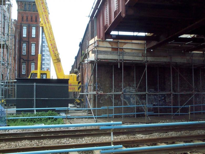 Abutment access scaffold. Crane in hospital grounds