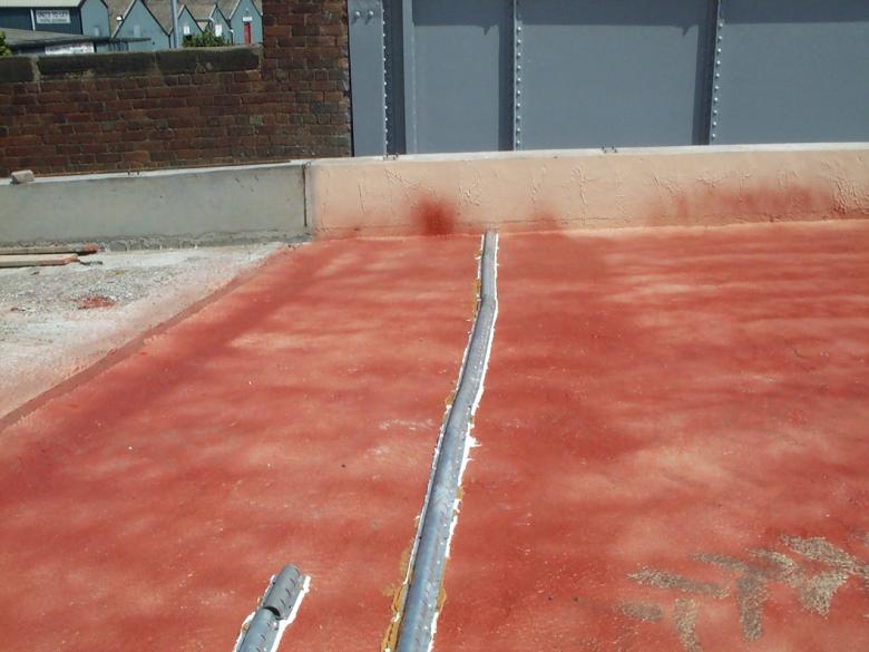 Honel drains fixed to the deck - red tack coat