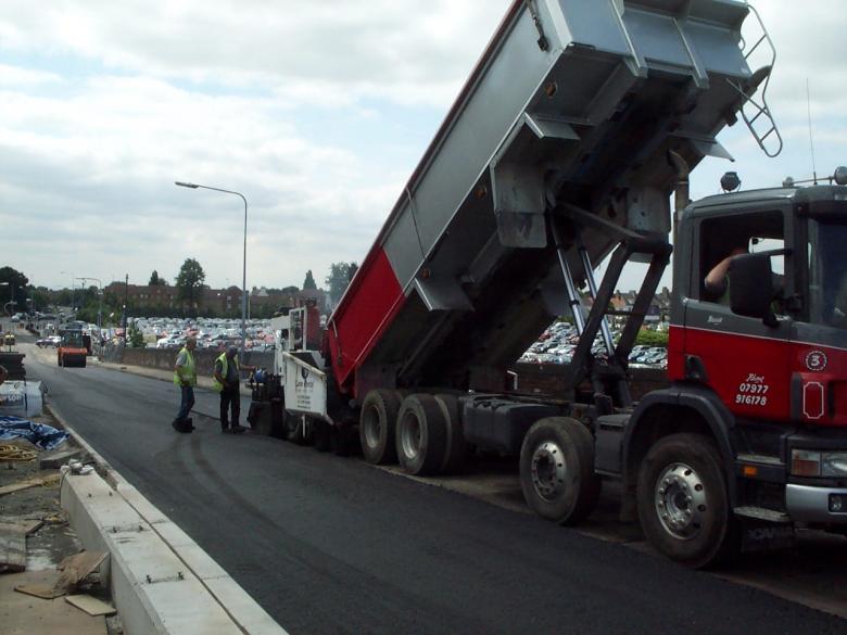 Black top being laid on the aproach