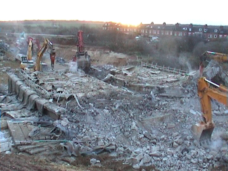 Bridge being broken up looking south 