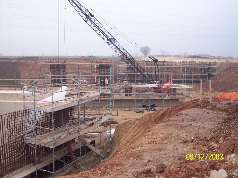 Formwork being erected around the columns