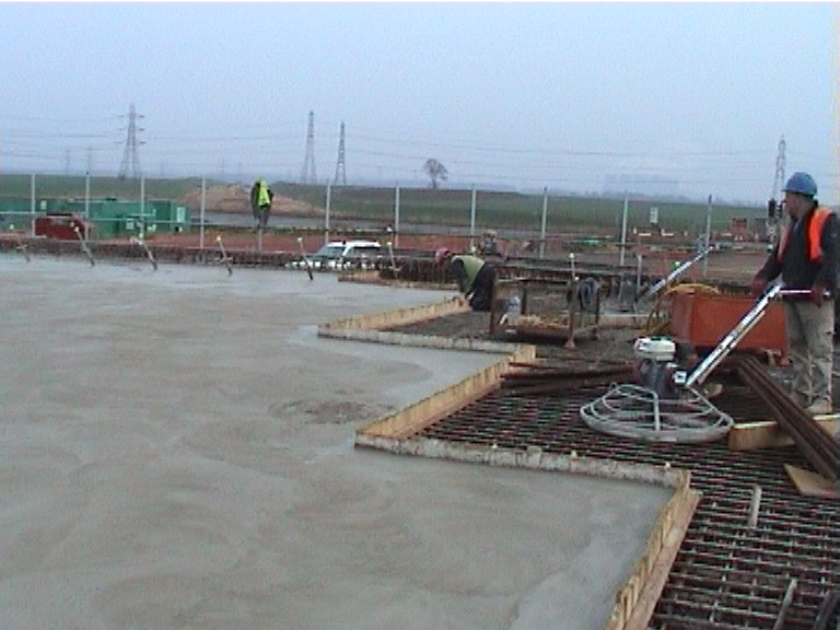 East abutment pour being power floated 