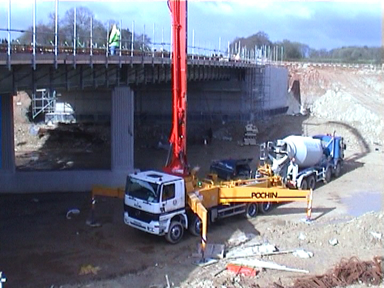 Concrete pump working on the central deck pour