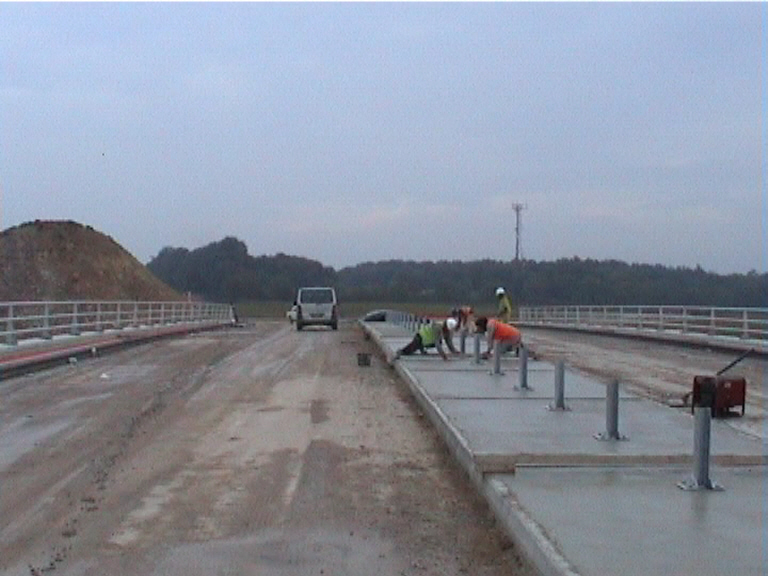 Central reserve concrete being placed