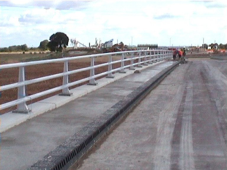 Concrete being placed to the Footpath