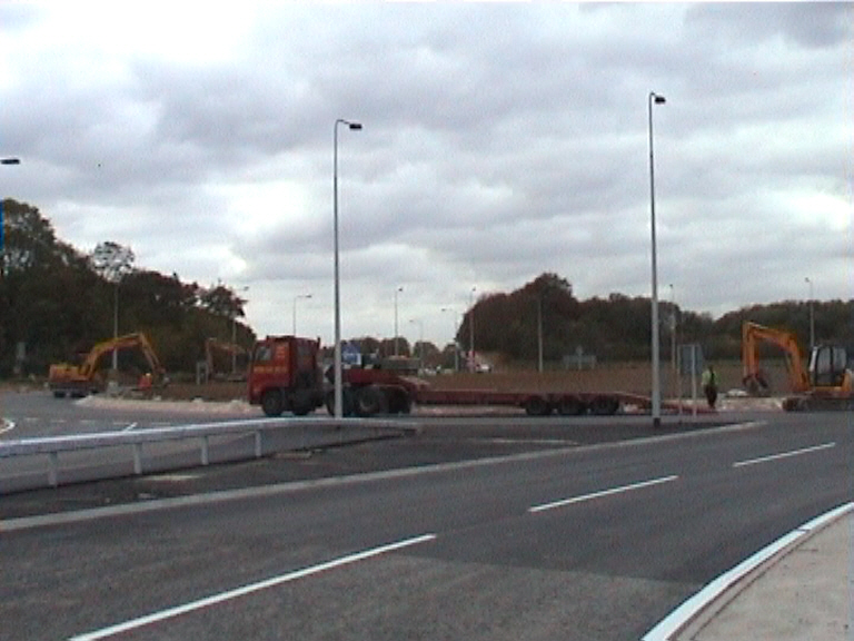 Finishing works to the road across the bridge 